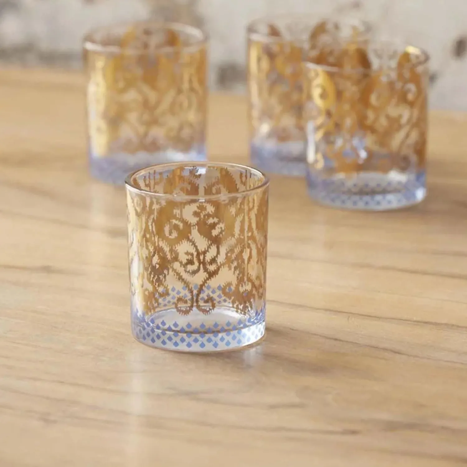 golden_ikat_cocktail_glass_1.webp Golden Ikat Cocktail Glass>Roger's Gardens Sale